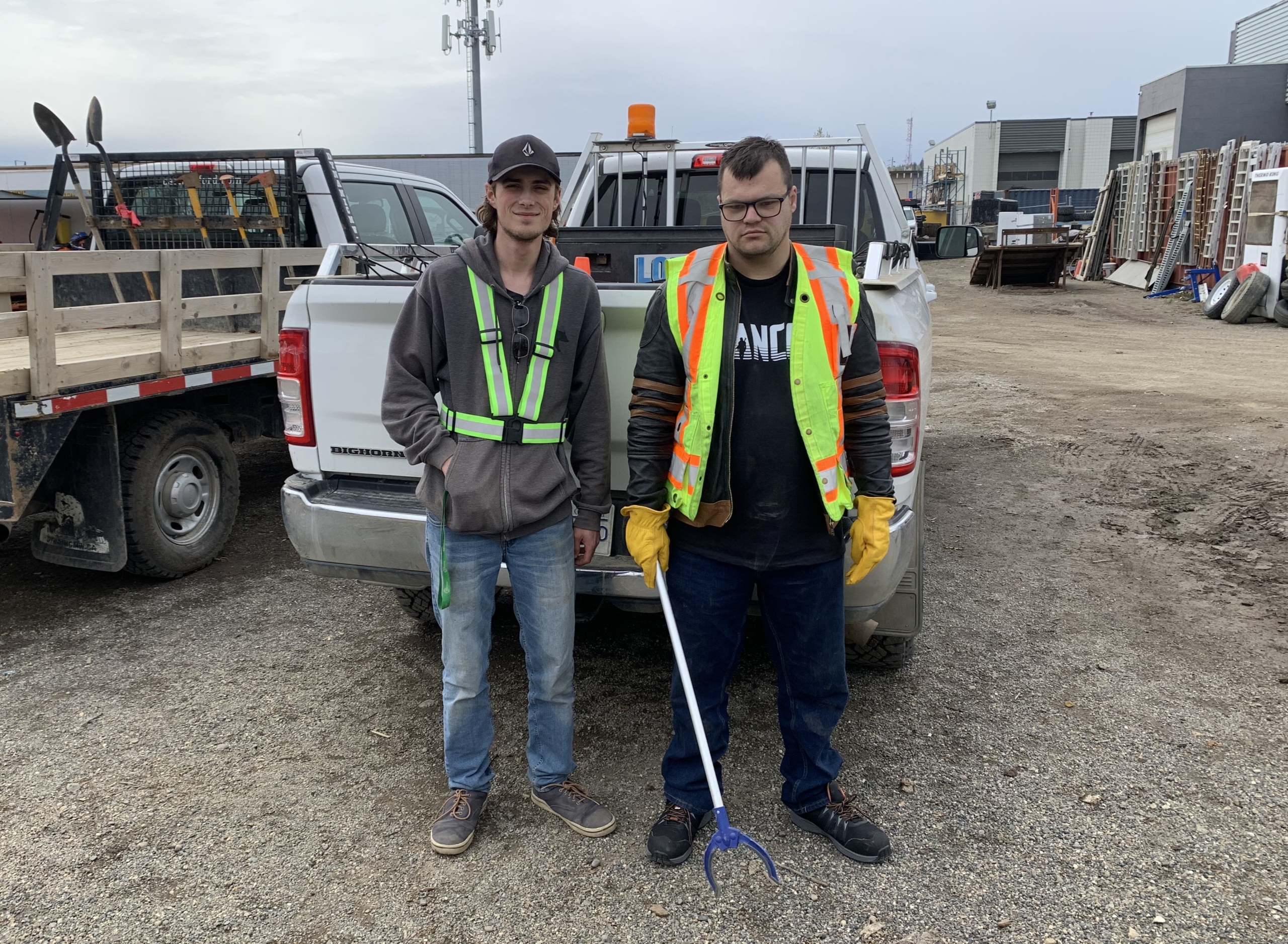 two men in safety vests